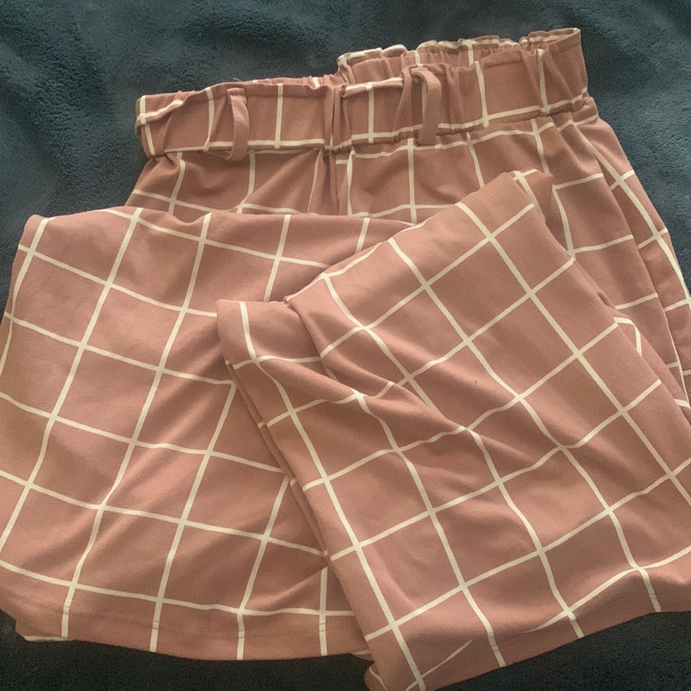 Capella size small pink leggings with white grid